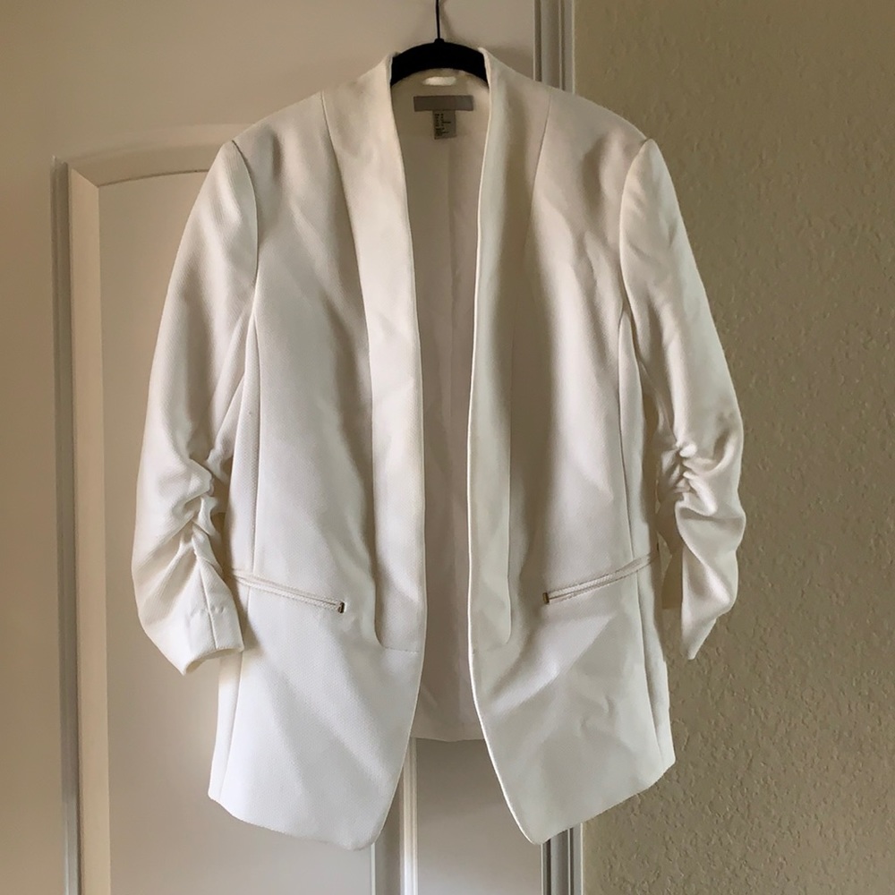 White blazer with rouged sleeve detail